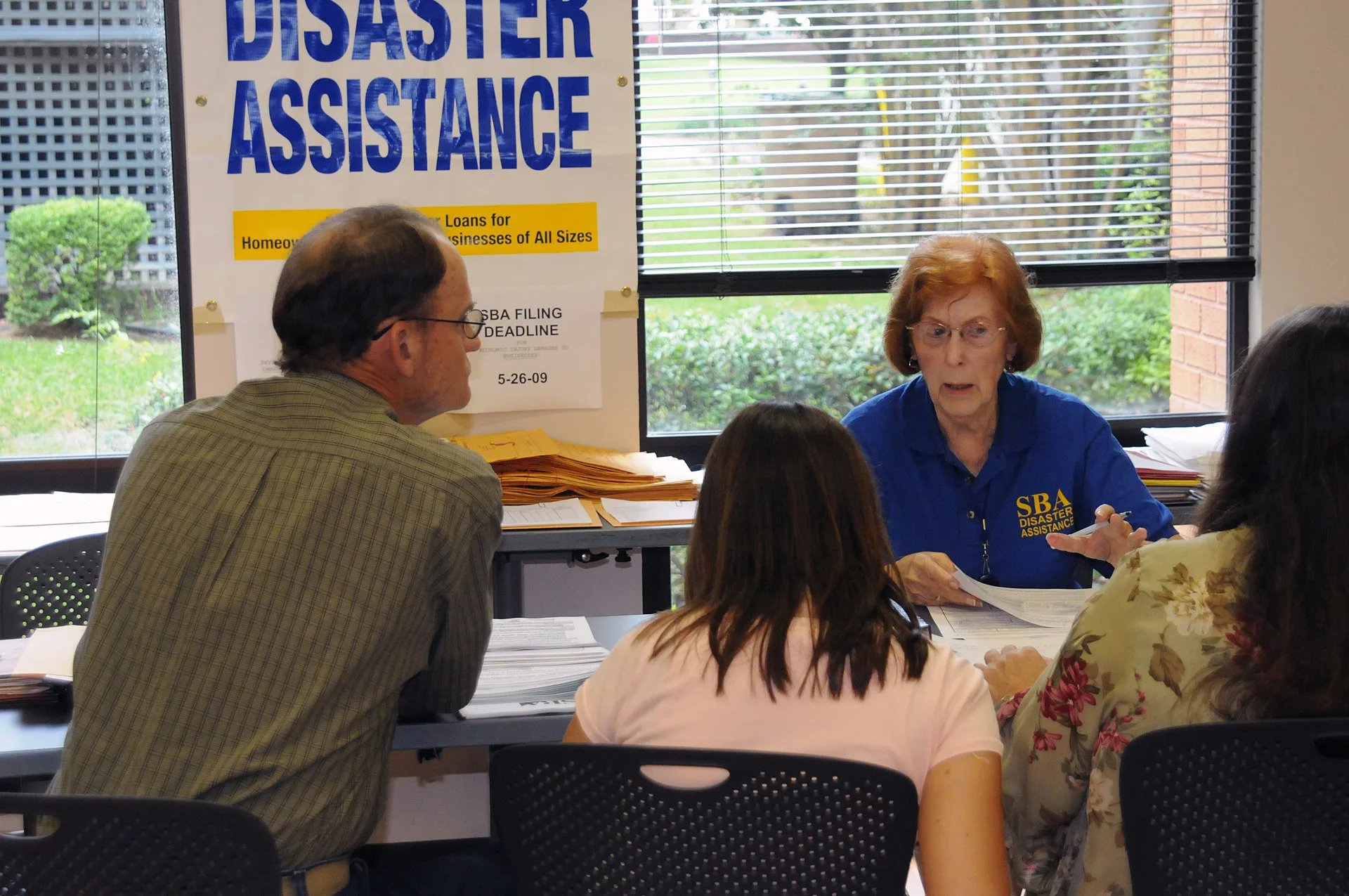 Tallahassee, FL, September 7, 2008 --At the Leon County Disaster Recovery Center(DRC) Lois Carey, Small Business Admin.(SBA) Customer Service Rep., explains how SBA can help residents affected by Tropical Storm Fay. George Armstrong/FEMA. What a customer interview can measure, and what it never will